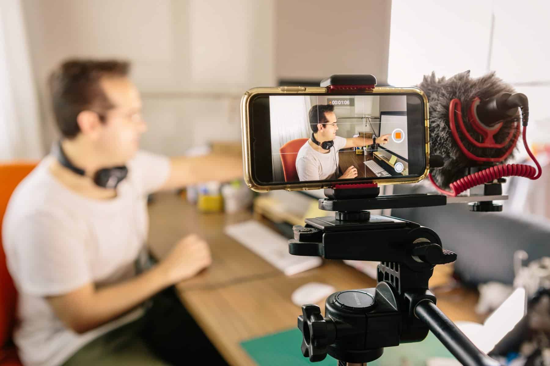 man shooting a video scopIO scaled 1