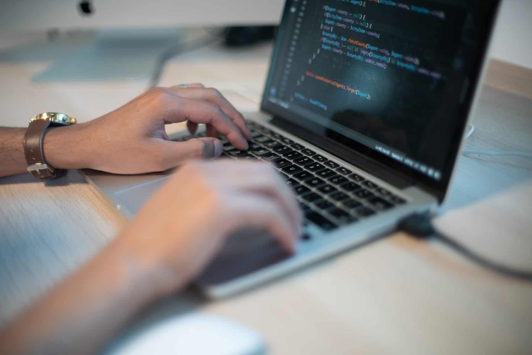 person doing codes scopIO scaled 1