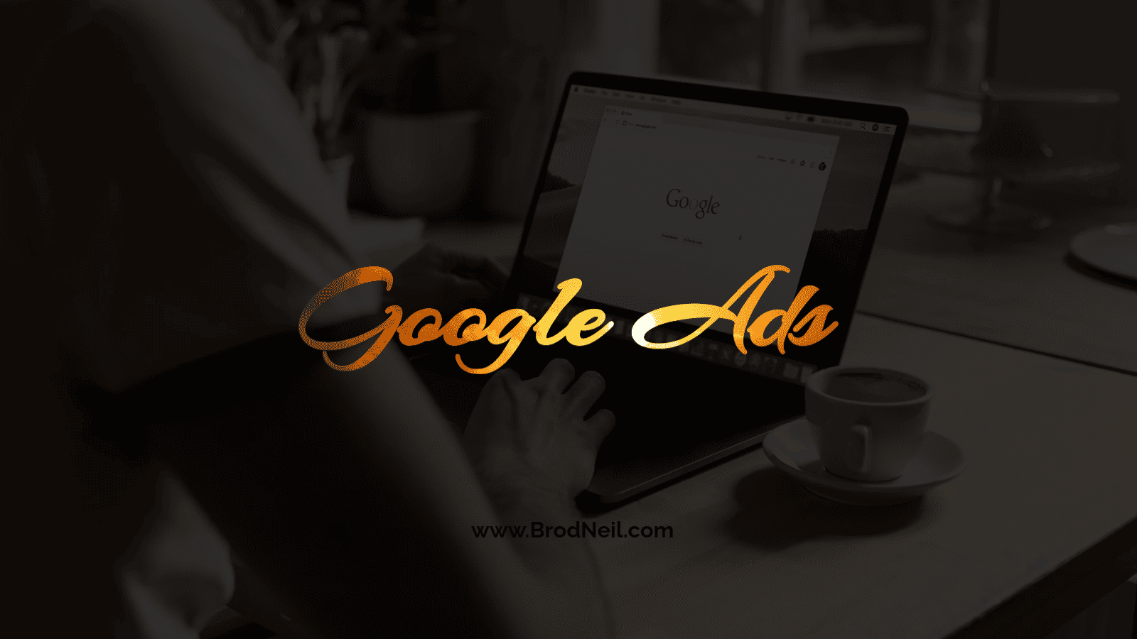 person typing on a computer to open Google Ads